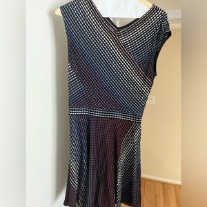 Barely worn. Perfect condition. Lovely, flowey, comfortable. Looks amazing on.